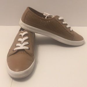 Calvin Klein tan, leather sneakers.